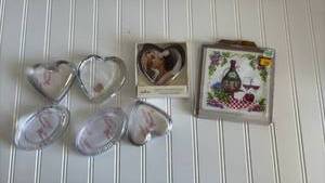lot 156 image: Heart Shaped Glass Photo Frames and Wine Cross Stitch