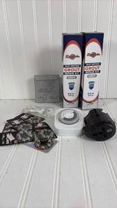 lot 253 image: Home Improvement Bundle - Grout Repair Kit, Hearing Aid Batteries, Timer & Travel Adapter