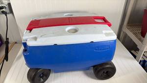 lot 354 image: Rubbermaid Rolling Cooler with Wheels and Red Handle