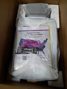 lot 31036 image: GE Profile Opal Ice Maker with Hard Water Map Documentation Powers On