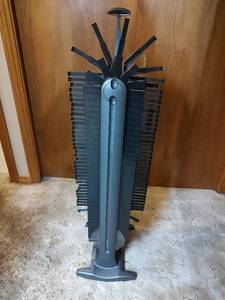lot 20 image: Battery Operated Rotating DVD Storage Tower, Untested