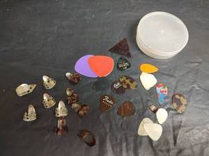 lot 31 image: Guitar Picks Collection with Finger Picks and Storage Case
