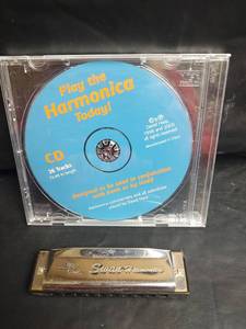 lot 32 image: Swan Harmonica with Play the Harmonica Today CD Set