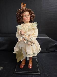 lot 305 image: Sophie  Porcelain Doll with Baby Doll Georgetown Collection
