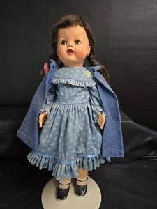 lot 307 image: Antique Ideal Doll with Blue Floral Dress and Coat