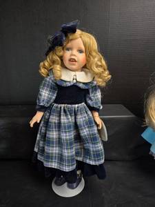 lot 308 image: Crowne Fine Porcelain Doll Sandra with Blue Plaid Dress