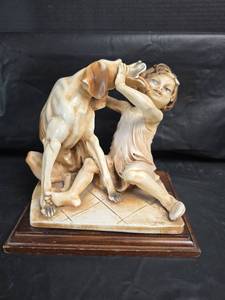 lot 312 image: Porcelain Figurine Child with Dog on Wooden Base- Needs reattached to base