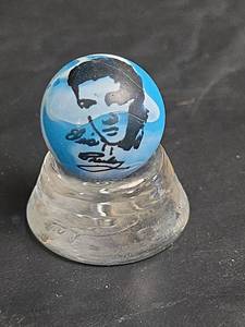 lot 333 image: Elvis Portrait Marble with Glass Stand