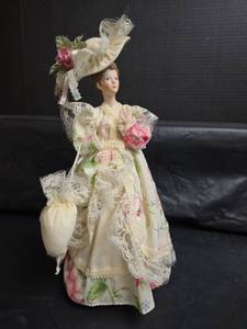 lot 389 image: Victorian Style Porcelain Doll Music Box with Lace Dress and Hat