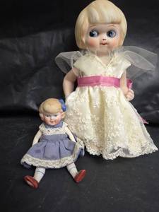 lot 393 image: Porcelain Dolls with Lace Dresses Set of Two