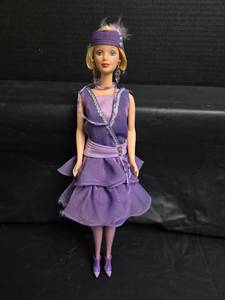lot 402 image: Barbie Doll in Purple 1920s Flapper Dress with Headband