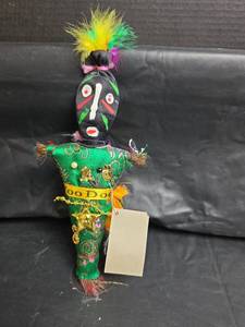 lot 404 image: New Orleans Voodoo Doll with Feathers and Instructions