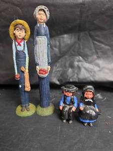 lot 407 image: Handcrafted Folk Art - Amish Kids On Bench are Cast Iron