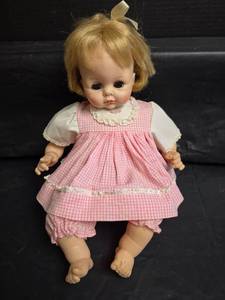 lot 410 image: Madame Alexander  15in. Baby Doll with Blonde Hair in Pink Gingham Dress 1960s