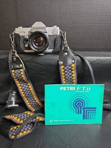 lot 454 image: Petri FT II 35mm SLR Film Camera with Manual and Colorful Strap