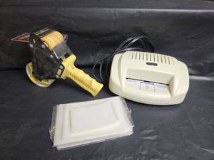 lot 483 image: Design Concepts Electric Laminator with Tape Dispenser and Laminating Pouches