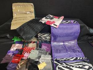 lot 534 image: Mixed Travel ToiletryJewelry Organizer Bags and Small Nylon Pull Tie Bags