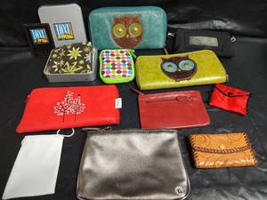 lot 535 image: (2) Owl Fossil Wallets and Small Purses