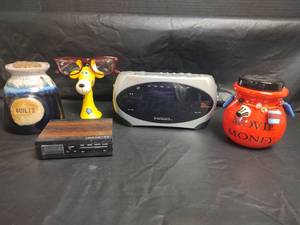 lot 578 image: Piggy Banks, Eyeglass Holder and Radios