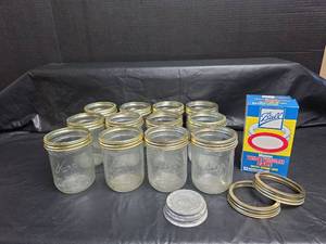 lot 665 image: Kerr Pint Canning Jars with Ball Wide Mouth Lids
