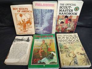 lot 718 image: Boy Scout Handbooks with Belt