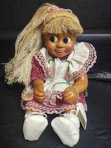 lot 752 image: Naber Kids Collectible Wood Doll with Blonde Hair and Pink Outfit with Certificate of Authenticity and Original Tags