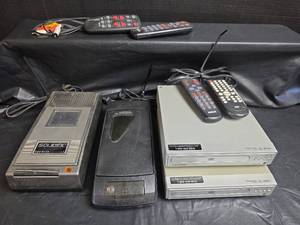 lot 816 image: Retro Electronics - Beta VCR, DVD Players and VHS Rewinder with Remotes