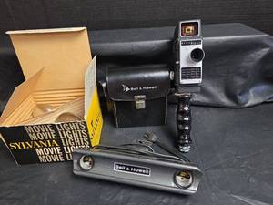 lot 820 image: Bell & Howell Electric Eye 8mm Film Camera with Case and Accessories