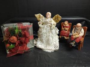 lot 869 image: Animated Lighted Angel, Santa Figures Sitting on Chairs, and More