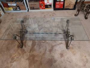 lot 888 image: Glass Top Coffee Table with Wrought Iron Base, 58 x24x16