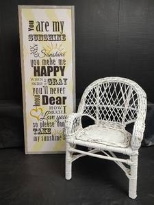 lot 899 image: White Wicker Chair and You Are My Sunshine Wall Sign