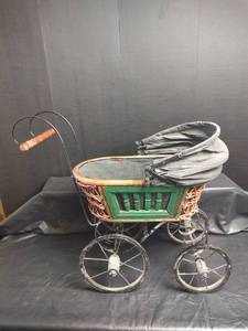 lot 915 image: Antique Wicker Doll Carriage with Green Wood Panel and Canvas Hood with Wooden Handle
