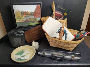 lot 932 image: Mixed Household Items Lot with Space Heater, Picture, Brief Case, Kitchen Drying Mat and More