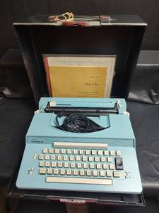 lot 938 image: Blue Royal Locking Traveler Electric Portable Typewriter with Case, Power Cord and Manual