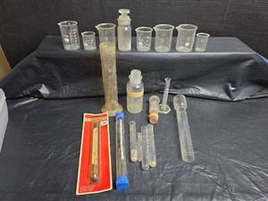 lot 949 image: Laboratory Glass Equipment Collection with Thermometer