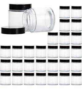 lot 1408 image: 4 Ounce Glass Jars with Lids, Hoa Kinh 30 Pack Clear Empty Cosmetic Containers Round Airtight Glass Jar with Black Lids for Storing Lotions, Powders, and Ointments