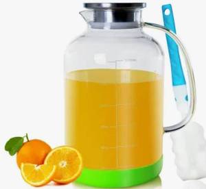 lot 1436 image: Glass Pitcher with Lid, GOTEBLE 102oz Glass Pitcher with Silicone Case and Brush, Large Capacity Glass Water Tea Pitcher for Juice, Milk, Cold Or Hot Beverages, Large Family and Party