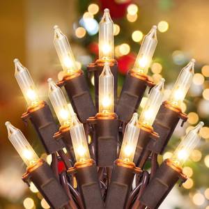lot 29282 image: YOUNGAR 13FT 50 Clear Christmas Lights Outdoor, Approved Christmas Tree Lights with Brown Wire, Incandescent Mini Light Plug in for Indoor Outdoor Tree Patio Garden Xmas Decor - Retail $13