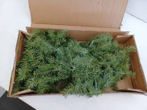 lot 11747 image: National Tree Company Pre-Lit Artificial Christmas Garland  Green  Carolina Pine  White Lights  Decorated with Pine Cones  Plug In  Christmas Collection  9 Feet