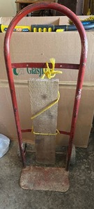 lot 59149 image: Red Metal Two-Wheel Hand Truck Dolly Cart - Retail $25