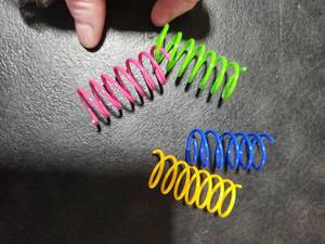 lot 7895 image: Colorful Plastic Coil Spring Toys Set - Retail $5