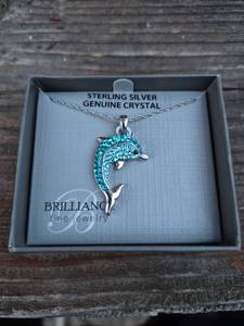 lot 125 image: Sterling Silver Blue Crystal Dolphin Necklace