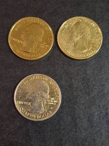 lot 149 image: Lot of Three Quarters