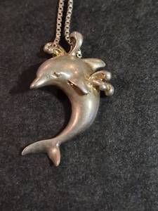 lot 151 image: Sterling Silver Dolphin Pendant Necklace