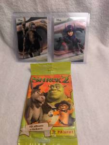 lot 605 image: Disney Topps Chrome Trading Cards Bundle with Shrek 2 Stickers
