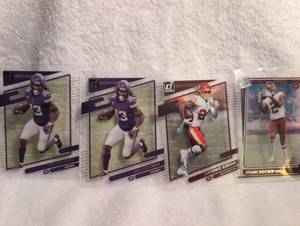 lot 1016 image: 2021 Panini Clearly Donruss NFL Football Trading Cards Collection - Cook, Gibson, Brown - 4 ct