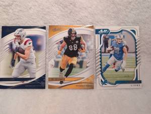 lot 1030 image: 2025 Panini Absolute Football Trading Cards Lot - Hunter Henry, Pat Freiremuth, TJ Hockenson - 3 ct