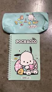 lot 3316 image: Set of 2 Sanrio Pochacco Items - 1 pencil pouch and 1 notebook