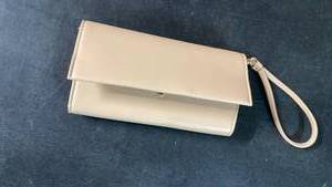 lot 3432 image: Target A New Day beige envelope-style wallet with strap