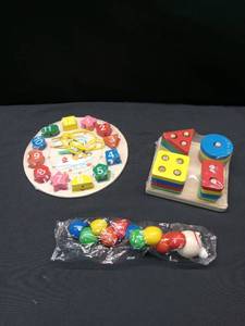 lot 2648 image: Wooden Educational Learning Clock and Shape Sorting  Toy Set
